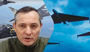 Юрій Ігнат на тлі винищувачів ЗСУ та російських дронів під час атаки РФ