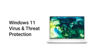 Ноутбук із Windows 11 Virus & Threat Protection на екрані